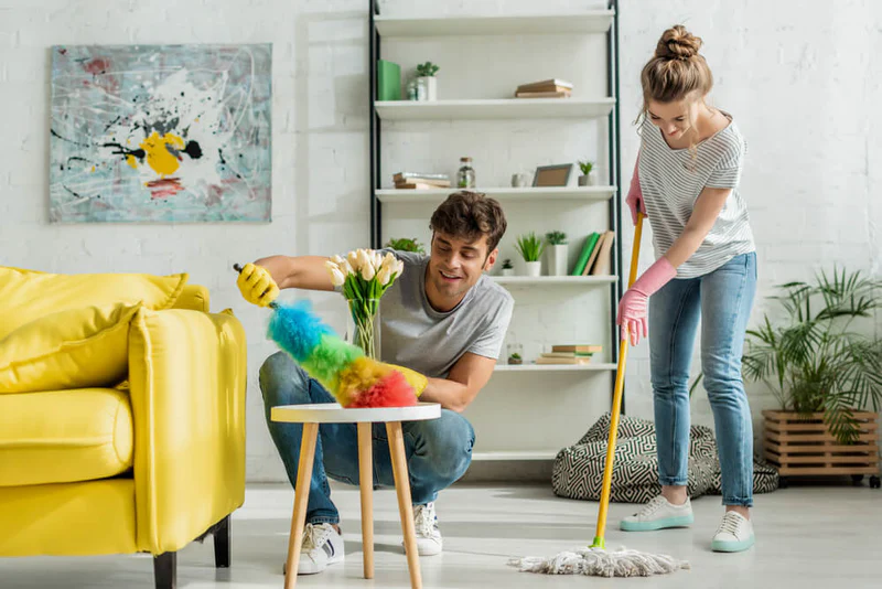 couple doing green spring cleaning couple cleaning