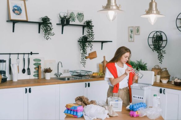  woman conducting a trash audit for the waste in the house